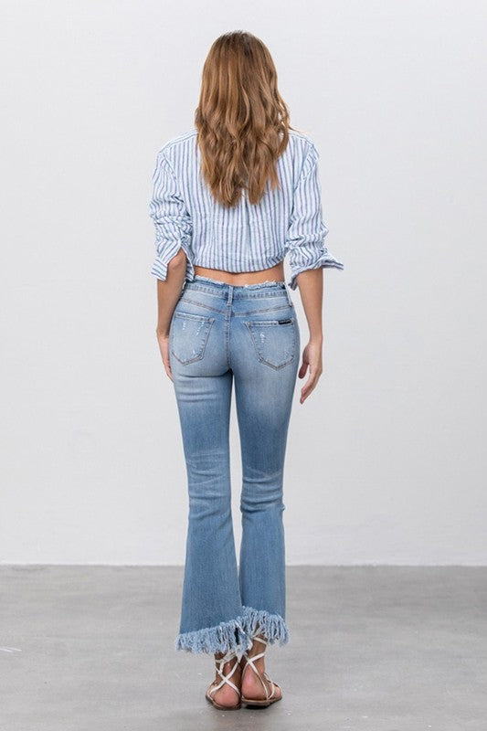 MID RISE LONG BOTTOM FRAYED CROP FLARE